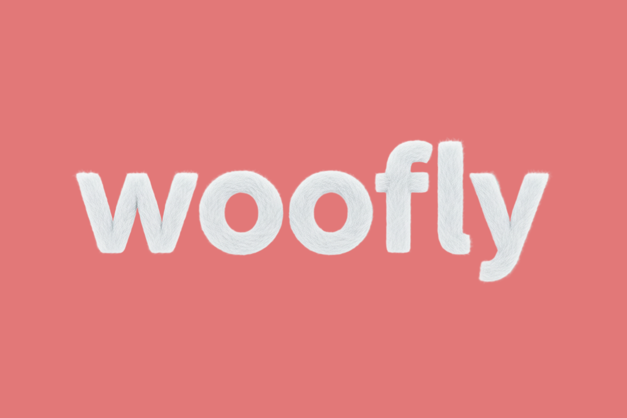 text reading "woofly" in a font that is simple, clean, has white fur. background is a light blueish green tone